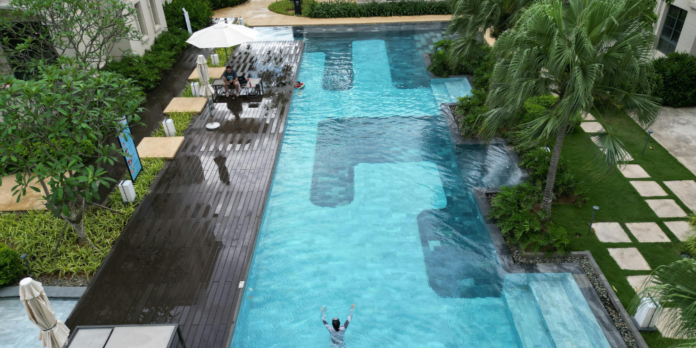 12x24 inground pool installed in a residential backyard showing standard rectangular layout