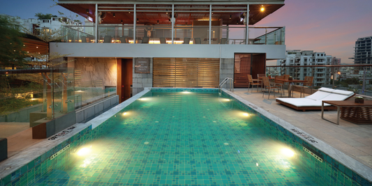 Residential home with an inground pool showing how a pool fits into overall property value