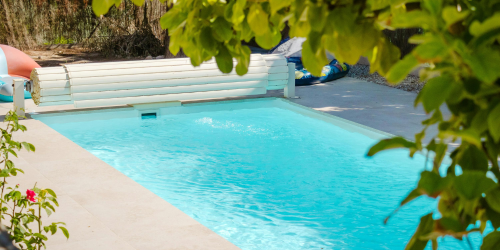 Inground pool installation in progress showing excavation and construction timeline stages